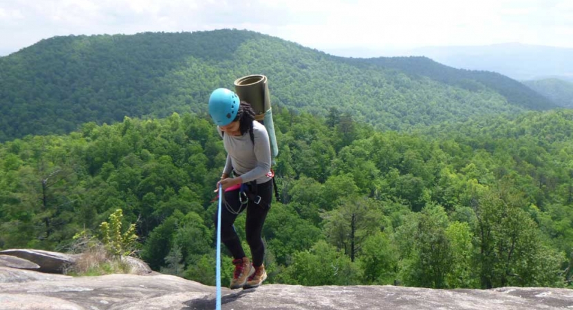 young adults rock climbing camp